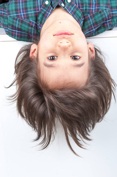 Young boy with his long hair - Фото, зображення