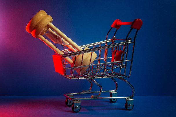 Shopping Time Concept - Cart and Clock or Hourglass. Creative li - Foto, Imagen