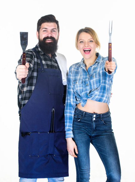 Cooking together. Couple in love getting ready for barbecue. Man bearded guy and girl ready for barbecue white background. Picnic and barbecue. American food tradition. Backyard barbecue party - Photo, Image