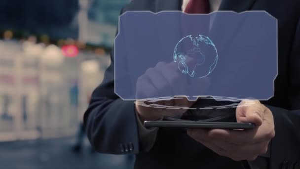 Businessman uses hologram Share - Video
