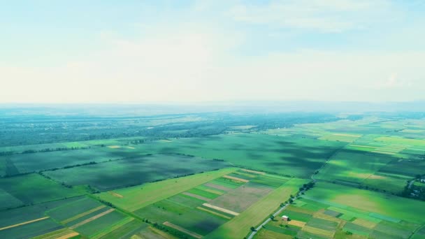 Breathtaking rural agricultural aerial footage with clouds and shadows sweeping across the landscape. - Felvétel, videó