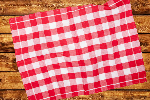 Top view of a empty red and white checkered kitchen cloth, texti - Foto, Imagen