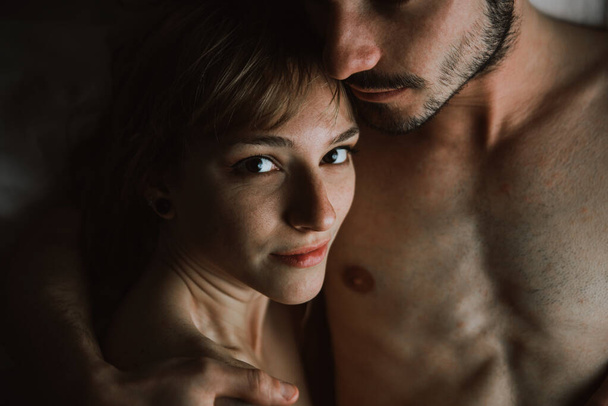 young couple relaxing in bed and having fun.  - Fotografie, Obrázek