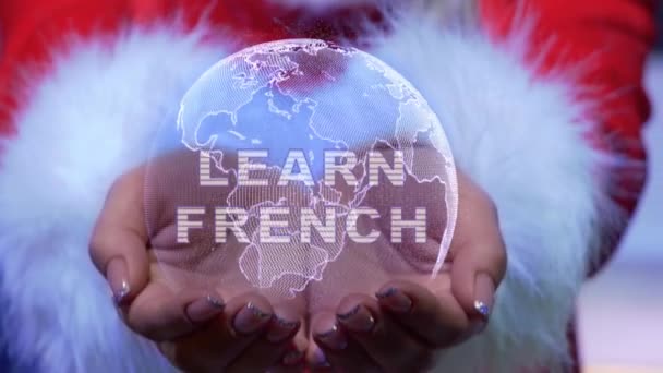 Hands holding planet with text Learn French - Video, Çekim
