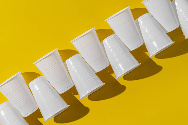 a fastfood white plastic cups, empty abstract plastic dishware - 写真・画像