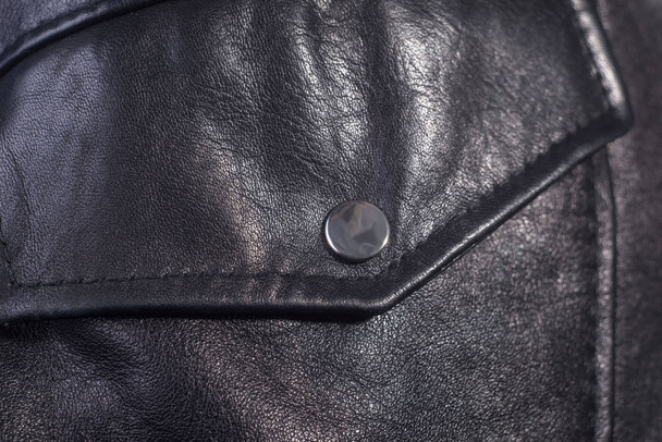 Veste Close-up en cuir de haute qualité, poche avec bouton
. - Photo, image