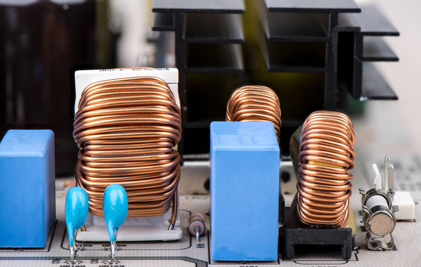 Inductors, resistors with capacitors and fuse close-up. - Photo, Image