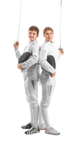 Молодые фехтовальщики на белом фоне
 - Фото, изображение