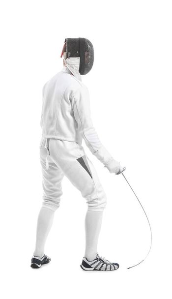 Young fencer on white background - Foto, afbeelding