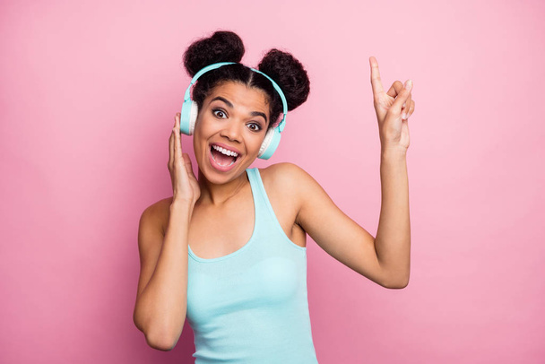 Close-up portrait of her she nice attractive lovely pretty charming funny funky cheerful cheery wavy-haired girl listening radio having fun isolated over pink pastel color background - Photo, Image