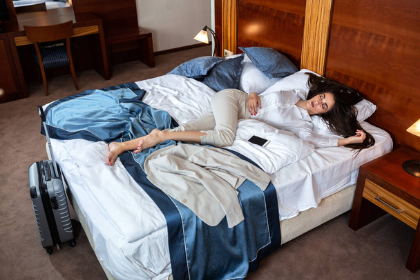 Elegant brunette woman sleeping during day - Foto, Imagen