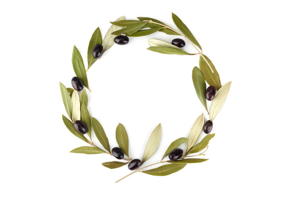 Top view of fresh black olive fruit with leaves as frame on white background. - Foto, Bild