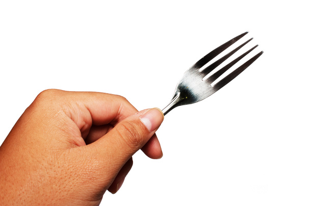 Main avec fourchette isolée sur blanc
 - Photo, image