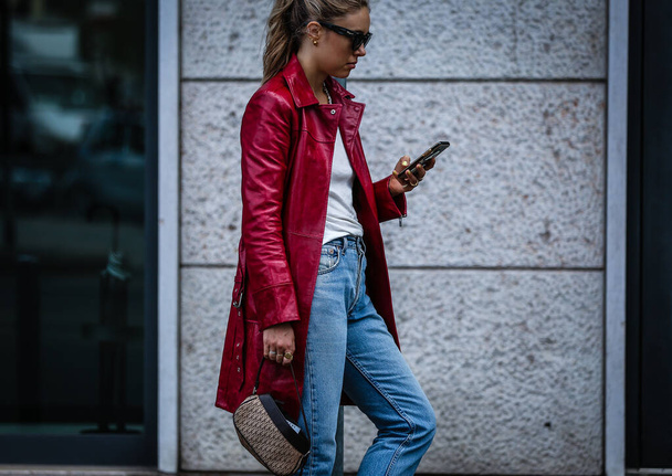 MILAN, Italy- September 20 2019: Woman on the street during the Milan Fashion Week. - Zdjęcie, obraz