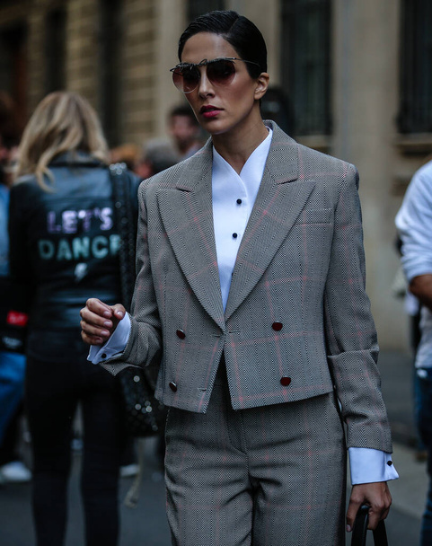 MILAN, Italy- September 21 2019: Woman on the street during the Milan Fashion Week. - Фото, изображение