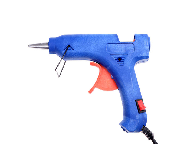 Pistola de pegamento azul aislada sobre fondo blanco  - Foto, Imagen