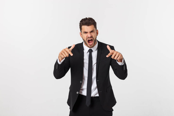 young handsome man shouting aggressively, looking very angry, frustrated, outraged or annoyed, screaming. Isolated over white background. - Foto, Imagen