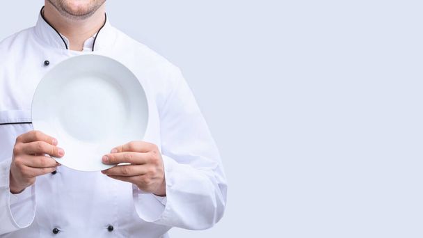 Plaque de maintien Chef méconnaissable sur fond de studio blanc, Panorama
 - Photo, image
