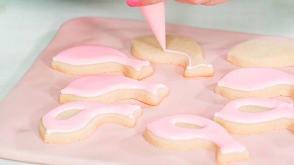 Step by step. Flat lay. Decorating Easter sugar cookies with rotal icing. - Photo, Image