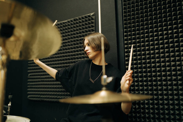Young woman playing drums, selective focus - Foto, Imagem