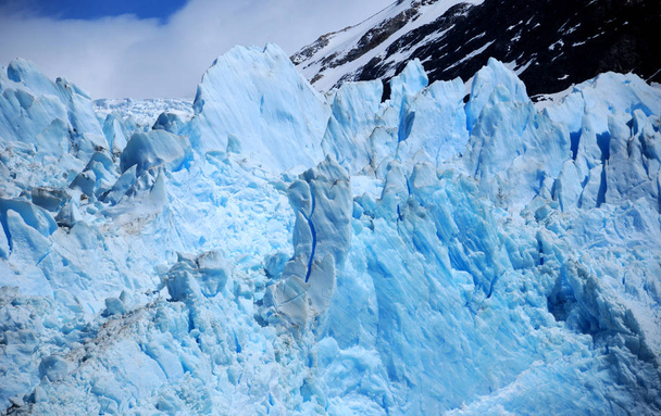 The Perito Moreno Glacier is a glacier located in the Los Glaciares National Park in the Santa Cruz province, Argentina. It is one of the most important tourist attractions in the Argentine Patagonia - Photo, Image