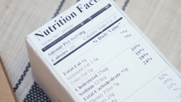 Nutrition label on food packaging - Materiał filmowy, wideo