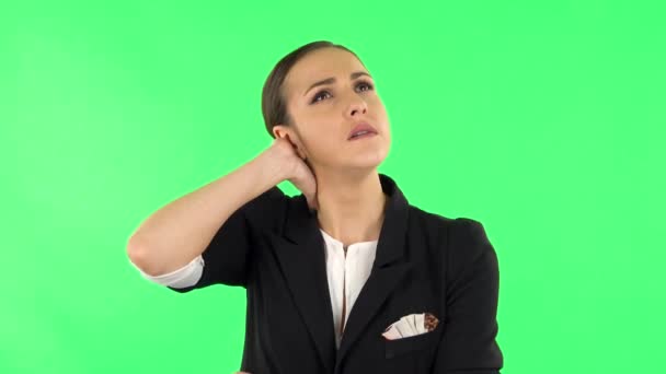 Woman suffering from headache from fatigue. Green screen - Záběry, video