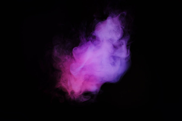 Abstract neon light smoke effect on black background. Smoke cloud explosion. - Foto, imagen