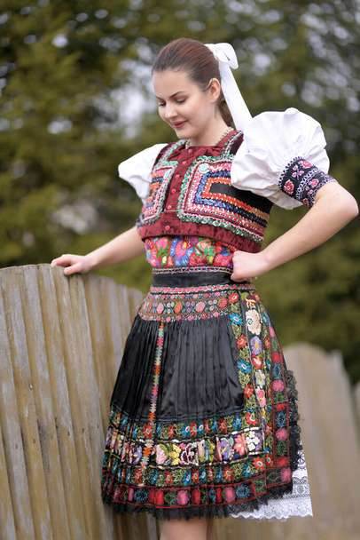 Young beautiful slovak woman in traditional costume - Photo, Image