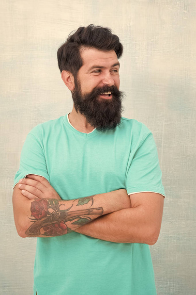 Grow long beard. Challenges like dryness ingrown hairs and irritation. Find best beard design shape for facial hair. Products is essential for maintaining men beard care. Bearded hipster brutal guy - 写真・画像