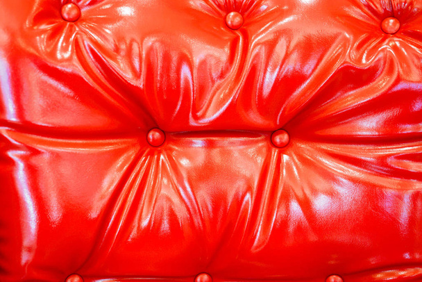 Closeup and crop red sofa leather background - Photo, Image