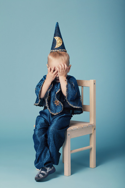 cute little magician portrait on blue - Foto, Imagem
