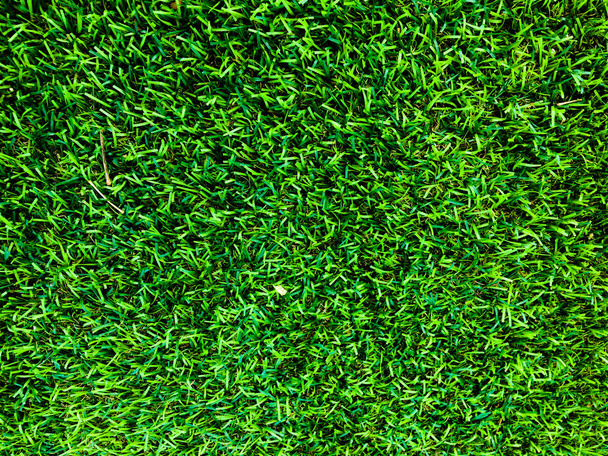 Vista da vicino di erba verde campo di calcio sfondo. Carta da parati per lavoro e design
. - Foto, immagini