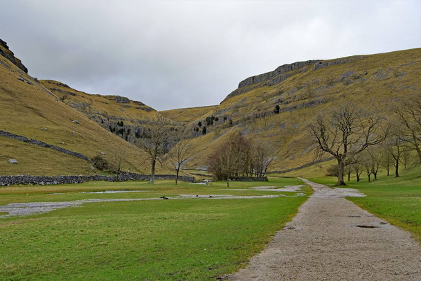 Malham is a fantastic place for hiking and enjoying clean air and spectacular views and vistas.  Janet's Foss, Gordale Scar, Malham Tarn and Malham Cove are all must sees. - Photo, Image