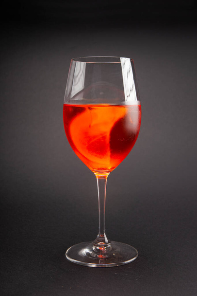 glass of wine in the studio on a gray background - Photo, Image