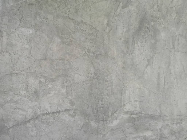 fissure sur mur de ciment nu couleur marron poli et surface lisse texture béton matériau vintage fond détail architecte construction briques murs plâtrés
 - Photo, image