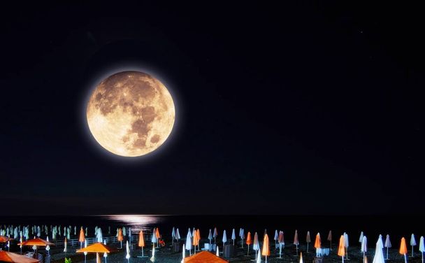 Moon collage of light lane on the Black Sea beach in summer  - Photo, Image