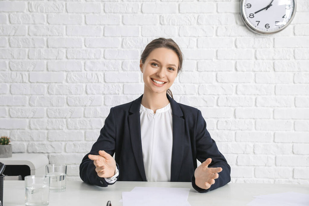 Young woman during job interview in office - Foto, Bild