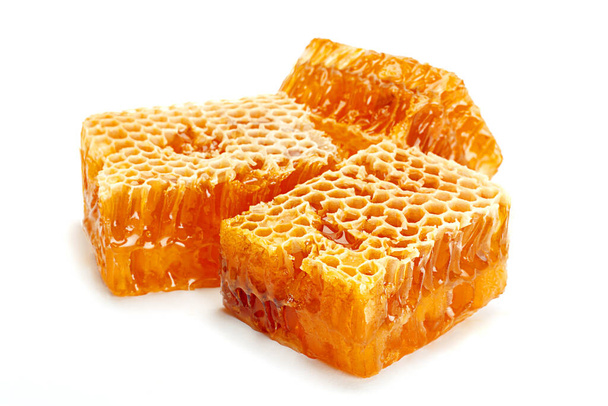 Yellow Honeycomb slice closeup isolated on white background - Photo, Image