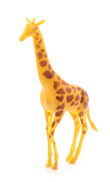 giraffe made out of plastic. animal toy isolated on white background - 写真・画像