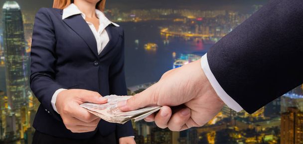 business woman and a businessman hold money - Photo, Image