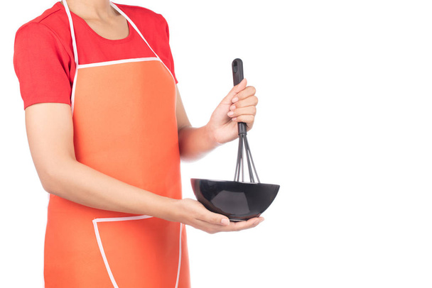 chef segurando utensílios de cozinha isolados no fundo branco
 - Foto, Imagem