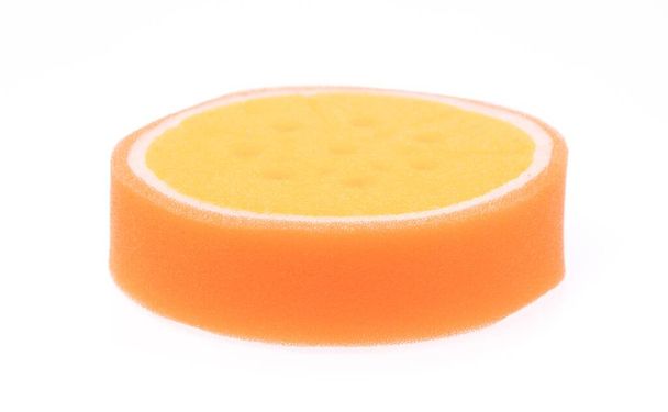 Orange sponge isolated on white background. - Photo, Image