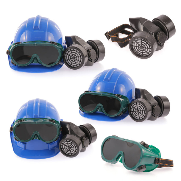 Verzameling van helm, chemisch beschermend masker en oogbescherming of bril op witte achtergrond - Foto, afbeelding