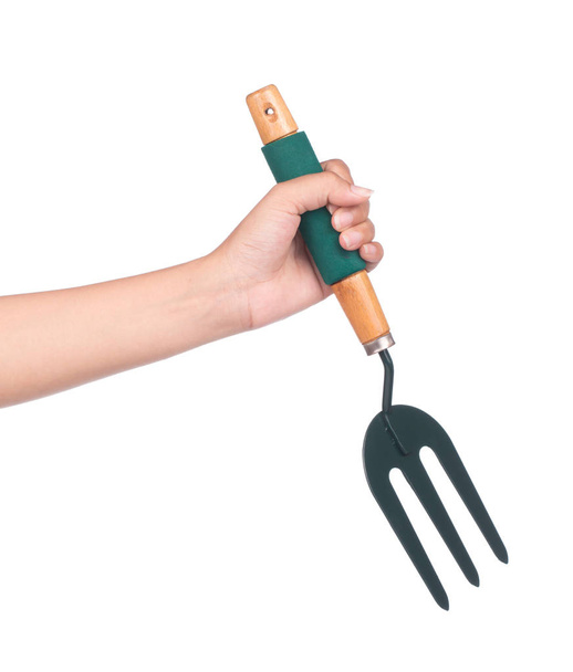 hand holding tool rake isolated on white background - Photo, Image