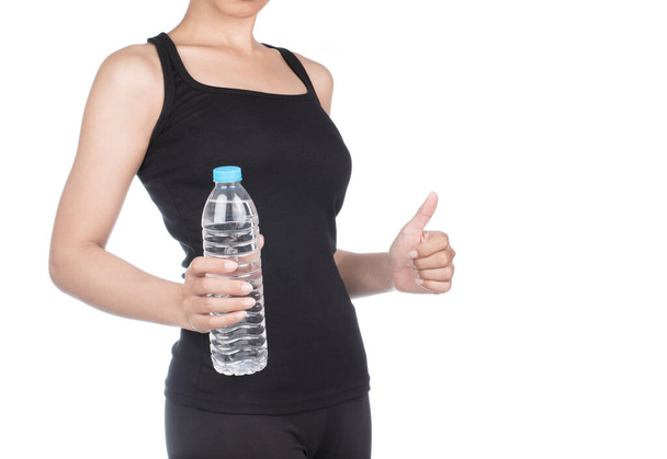 joven deportista sosteniendo una botella de agua aislada sobre fondo blanco
 - Foto, Imagen