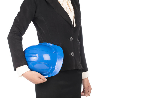 bussineaa mujer celebración casco de seguridad de la construcción aislado sobre fondo blanco
 - Foto, imagen