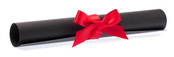 roll black paper with red ribbon isolated on white background - Photo, Image