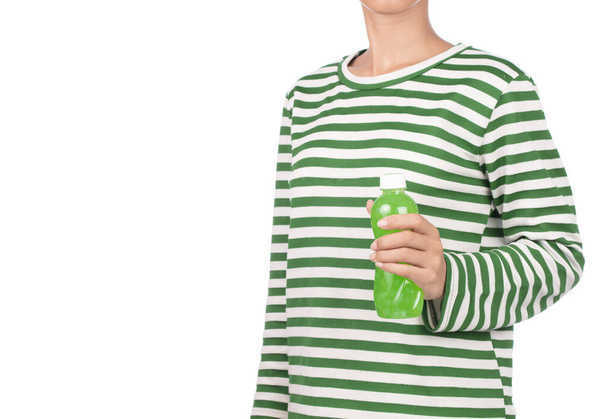 Hand holding bottle of kiwi juice isolated on white background - Zdjęcie, obraz