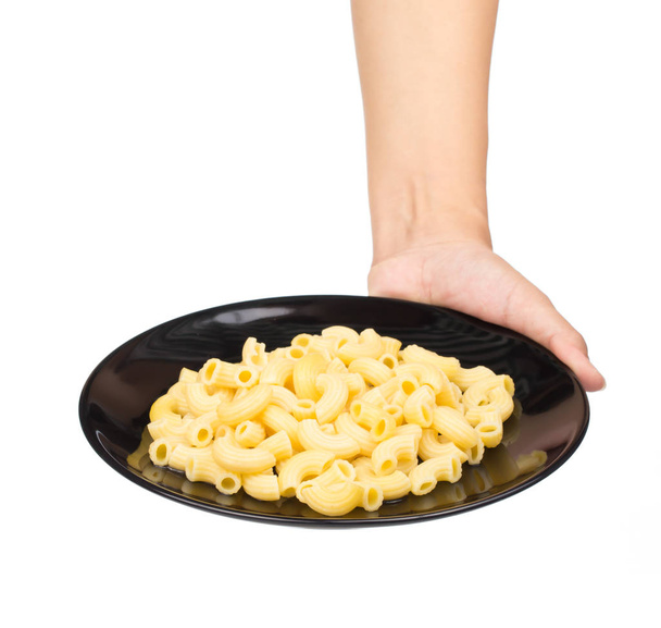 Hand halten Gericht mit Pasta isoliert auf weißem Hintergrund - Foto, Bild